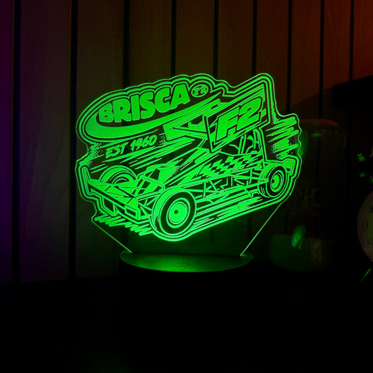 Brisca F2 stock car acrylic night light green LED on bedside table next to alarm clock
