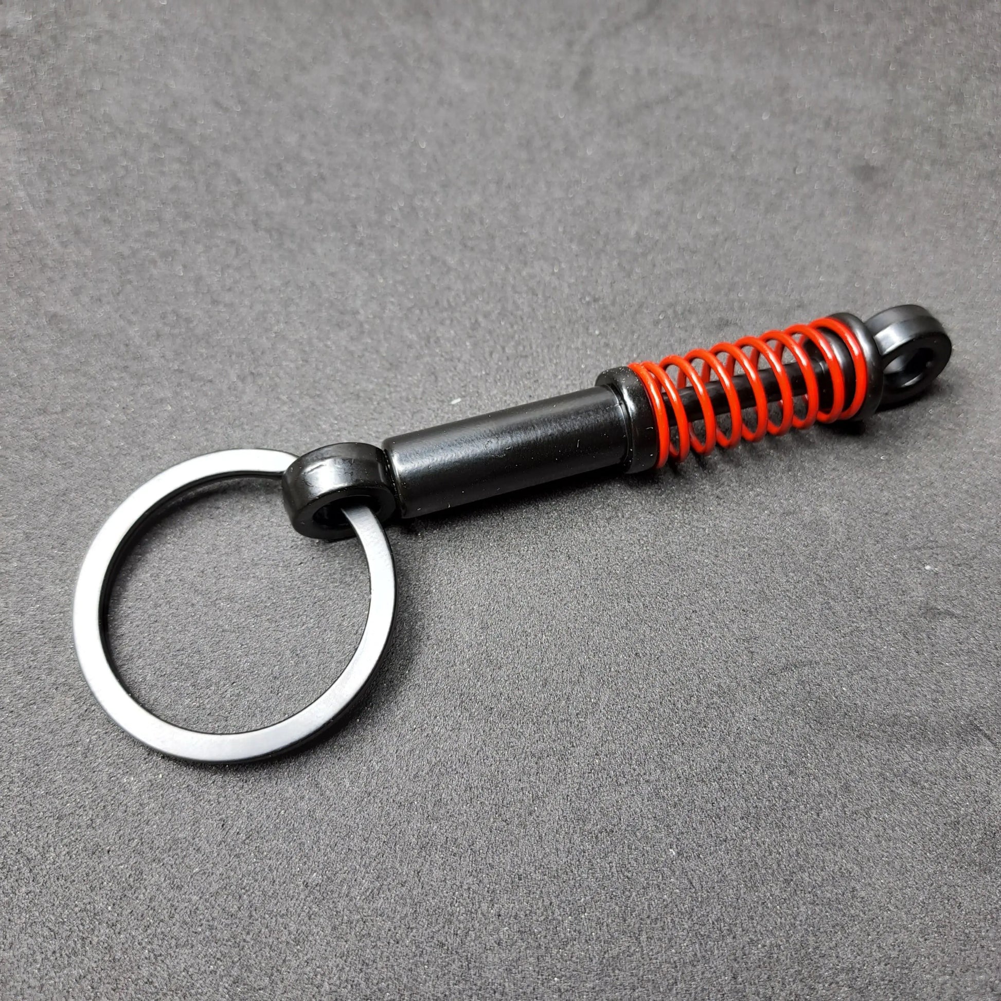 Spring Suspension Shock Absorber Keyring  Key Ring Stock Car & Banger Toy Tracks